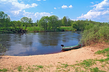 Image showing motor boat on river coast 
