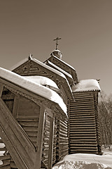 Image showing wooden chapel on blue background, sepia