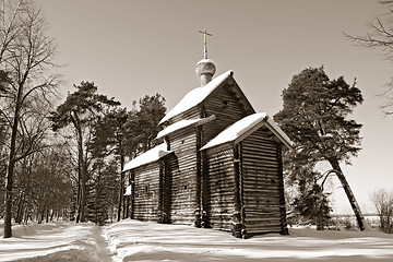 Image showing wooden chapel in pine wood, sepia