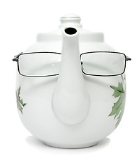 Image showing Porcelain teapot with glasses