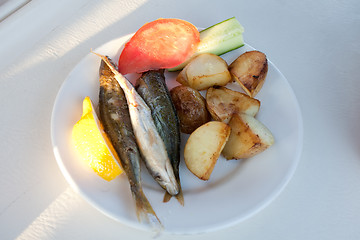 Image showing fried fish and potatoes 