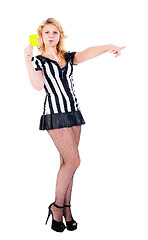 Image showing Attractive referee showing yellow card