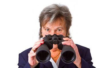 Image showing Female senior business woman with binoculars