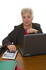 Image showing Female senior working in office