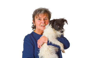 Image showing Female senior with puppy