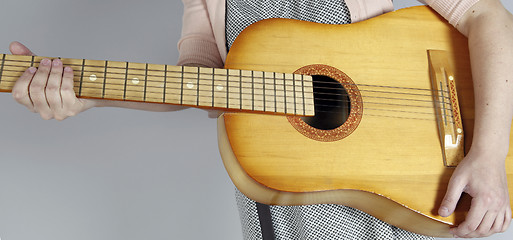 Image showing Playing the guitar