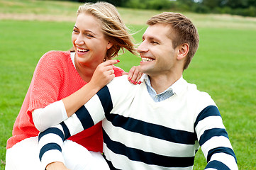 Image showing Woman pointing at her lovable husband