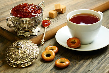 Image showing Tea with fig jam.