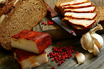 Image showing Salt pork with red pepper and rye bread.
