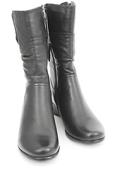 Image showing Two black female boots