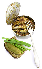 Image showing Anchovies in a tin can with rye bread
