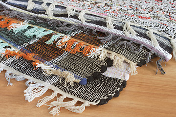 Image showing Homespun mat of colored ribbons