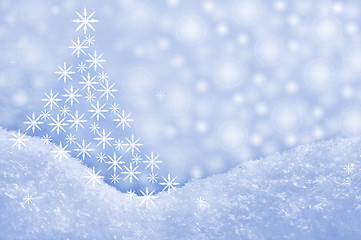 Image showing Detail of snowdrift and Christmas tree