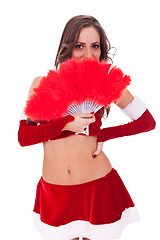 Image showing sexy santa with red feather fan