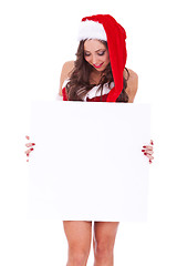 Image showing santa woman looking at a blank board