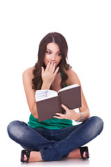 Image showing woman reading a thriller book