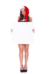 Image showing santa woman presenting a blank board