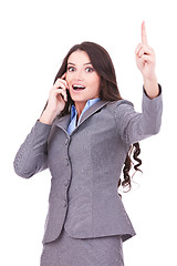 Image showing business woman on the phone winning