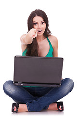 Image showing woman with laptop pointing