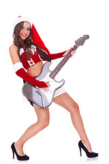 Image showing santa woman  playing an electric guitar