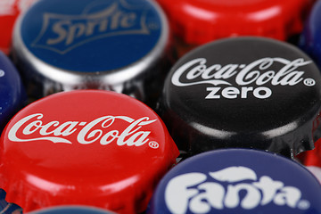 Image showing Bottle caps of Coca-Cola products