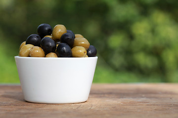 Image showing Green and black olives