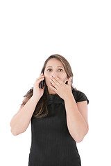 Image showing Portrait of woman making a phone call against a white background