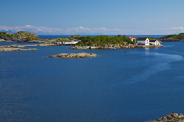 Image showing Rocky islets with fishing port