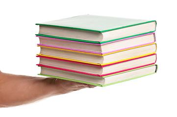 Image showing Hand with books