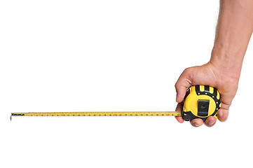 Image showing Hand with tape measure