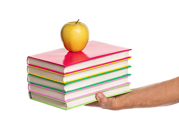 Image showing Hand with books