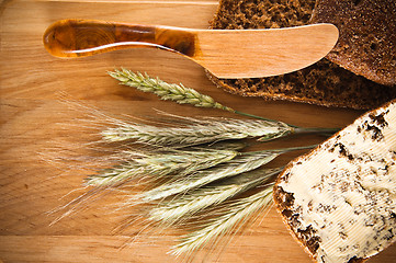 Image showing Still life with bread and spikes