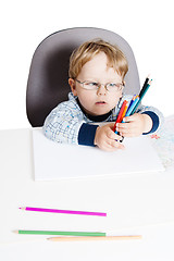 Image showing Portrait of the little boy with pencils