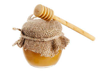 Image showing jar of honey, it is isolated on white