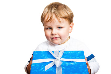 Image showing Portrait of the little boy with a gift, it is isolated on white