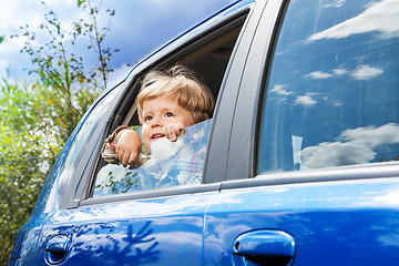 Image showing little boy on the back car sit