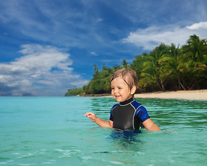 Image showing Little boy in the wetsuit