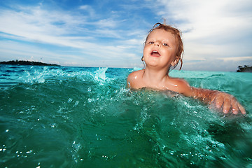 Image showing Two year old kid swimming
