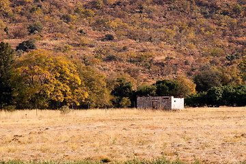 Image showing Abandoned Shack Against Majestic Mountain  