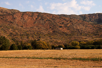 Image showing Abandoned Shack Against Majestic Mountain  