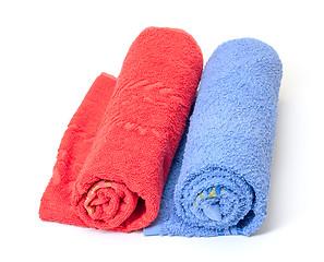 Image showing Rolled red and blue towels