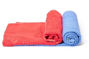 Image showing Rolled red and blue towels