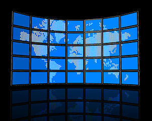 Image showing Video wall of flat tv screens with world map