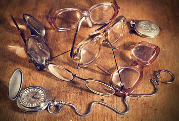 Image showing many Glasses and watch