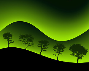 Image showing Green Mountains and Silhouetted Trees