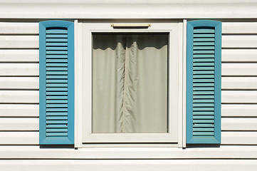 Image showing Window with wooden shutters