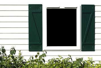 Image showing Window with wooden shutters