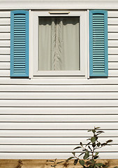 Image showing Window with wooden shutters