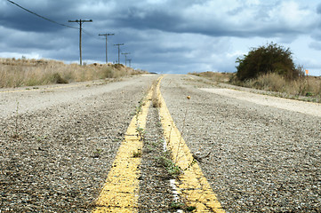 Image showing Old dramatic asphalt road