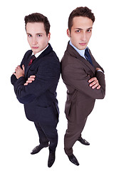 Image showing two serious young men with arms crossed 